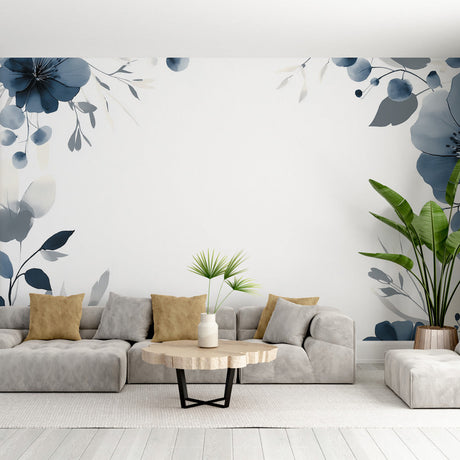 Blue watercolor floral wallpaper creating a peaceful atmosphere in a bright modern living room with white furniture