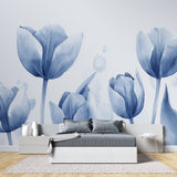 Home office space with calming blue floral wallpaper and wooden desk
