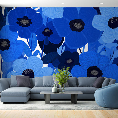 Blue floral wallpaper creating a stunning accent wall in a bright modern living room with white furniture