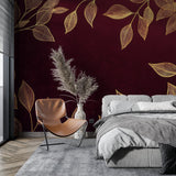 Living room accent wall with botanical burgundy and gold wallpaper