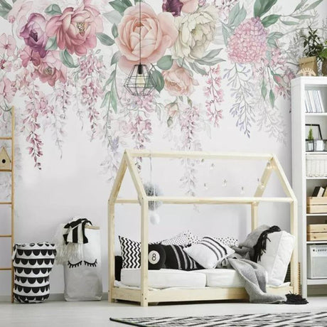 Pink rose and wisteria wallpaper in bright modern bedroom showing floral wall mural's soft color palette