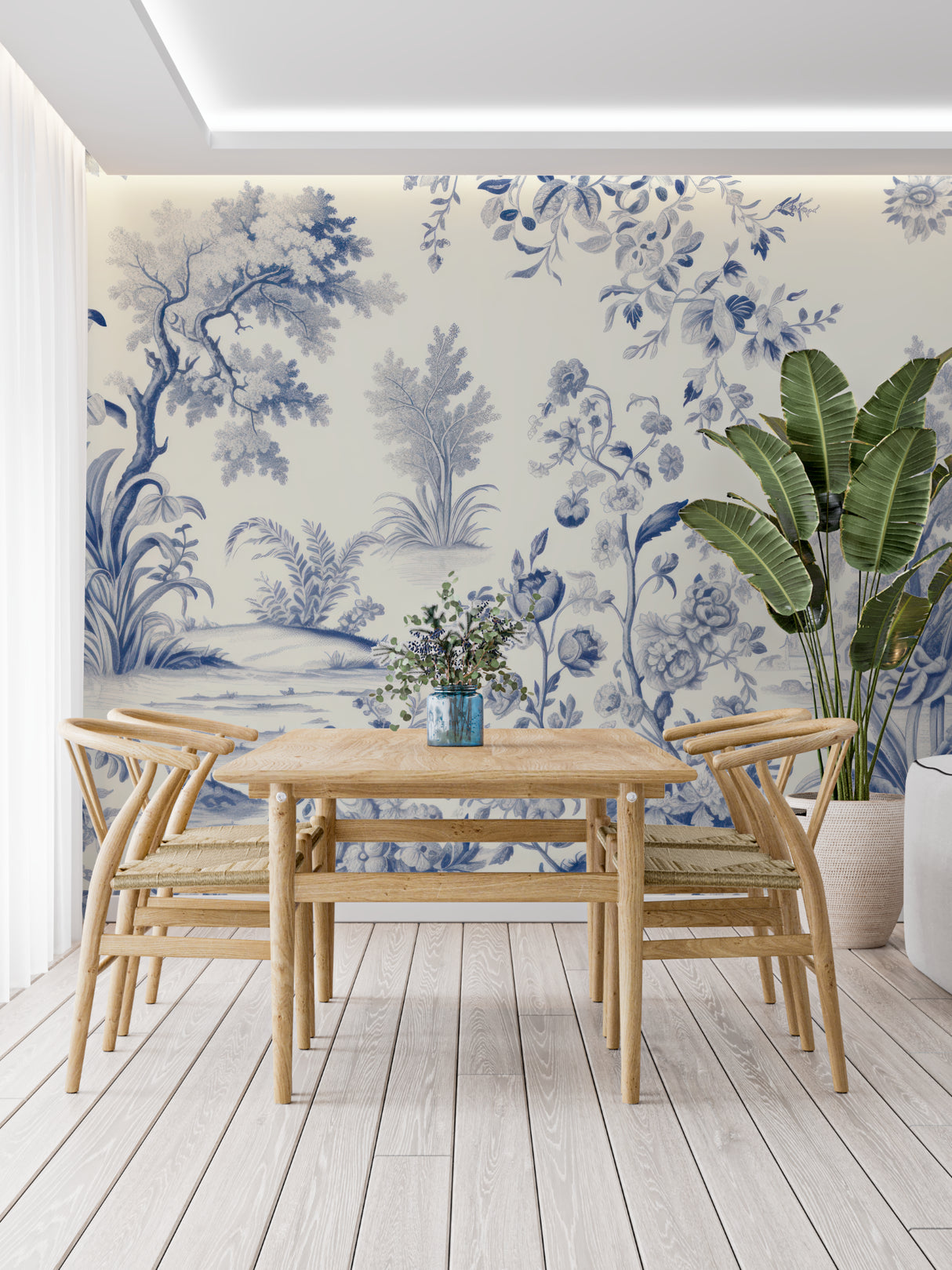 Entryway featuring French-inspired blue Toile wallpaper with antique mirror and console table