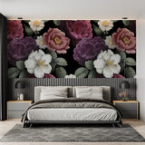 Elegant bedroom featuring dramatic black and purple flower wall mural above a plush bed