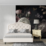Botanical wallpaper featuring dark background in home office with brass details