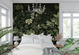 Dark green botanical garden wallpaper in modern living room creating a sophisticated atmosphere