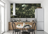 Dark botanical wallpaper adding depth to home office space