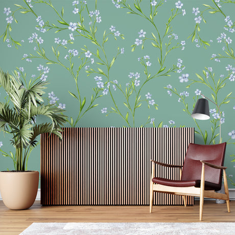 Blue floral wallpaper creating a peaceful atmosphere in a modern living room with natural light
