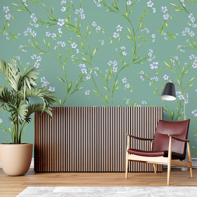 Blue floral wallpaper creating a peaceful atmosphere in a modern living room with natural light
