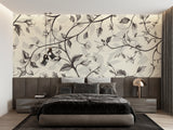 Black and white floral wallpaper creating an elegant backdrop in a modern living room setting