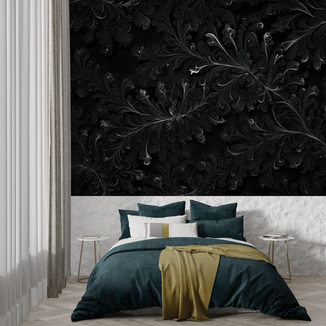 Black damask wallpaper in modern living room showing elegant floral pattern with silver details