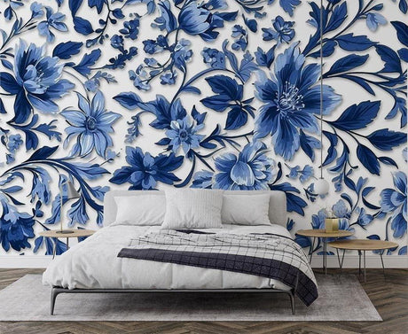 Blue floral wallpaper creating an elegant atmosphere in a bright modern living room with white furniture