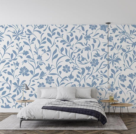 Blue and white floral pattern wallpaper creating a fresh look in a bright modern living room setting