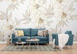 White and Gold Lily Wallpaper in bright living room with minimalist furniture