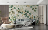 Green and gold leaf wallpaper mural creating depth in a dining room