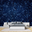 Navy blue floral wallpaper creating an elegant atmosphere in a modern living room