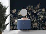 Gold floral line art wallpaper bringing elegance to a modern dining room with navy accent wall