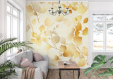 Elegant gold leaf mural wallpaper featured in cozy dining room setting