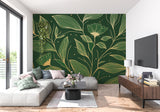 Emerald green floral wallpaper with golden accents brightening up a cozy dining room