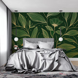 Green and gold leaf wallpaper creating an elegant atmosphere in a master bedroom
