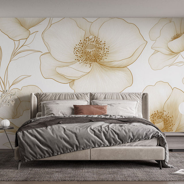 Golden floral line art wallpaper creating an elegant atmosphere in a bright modern living room with minimalist furniture
