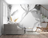 Home office space with modern grey and gold floral wall mural creating focal point