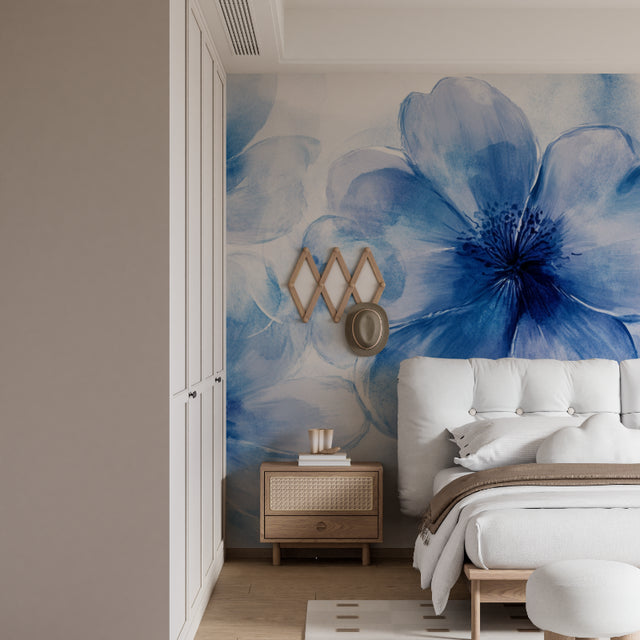 Blue floral wallpaper mural in modern bedroom, creating a peaceful sleeping space with watercolor blooms
