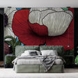 Red and white poppy wallpaper creating a stunning feature wall in a bright modern living room with minimal furniture