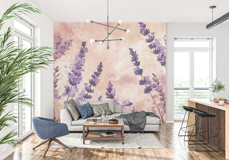 Lavender floral wallpaper mural in modern living room with gray sofa and natural light