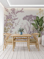 Botanical wallpaper mural with mauve and gold flowers creating a peaceful atmosphere in a modern living room