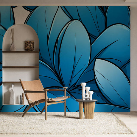 Modern blue leaf wallpaper mural styled in a contemporary living room with minimal furniture and natural light