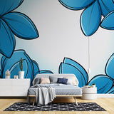 Modern blue floral wallpaper mural displayed in a bright living room, creating a fresh and airy atmosphere