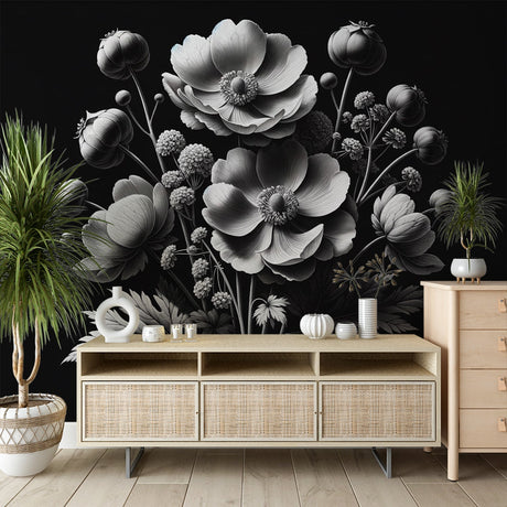 Black and white floral wallpaper in modern living room creating dramatic contrast against neutral furniture