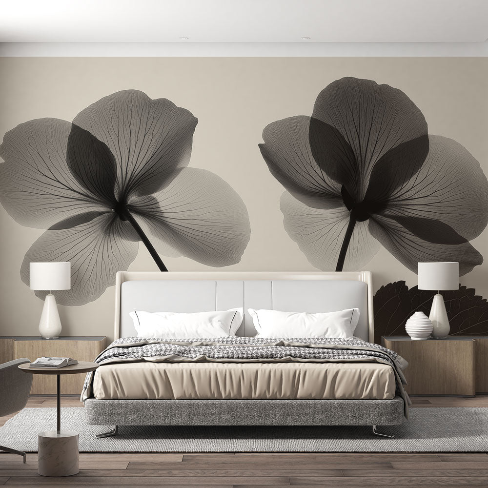 Monochrome Begonia X-ray floral wallpaper creating dramatic impact in a modern living room with clean lines and natural light