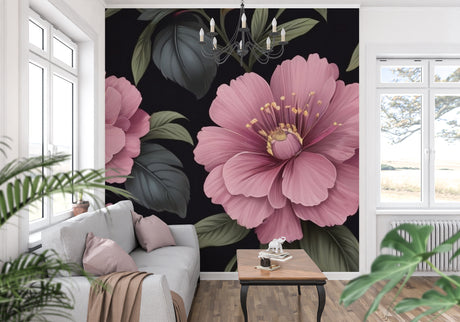 Pink floral wallpaper mural creating a dramatic accent wall in modern living room with grey sofa