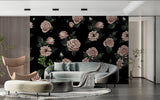Pink roses on black wallpaper mural in cozy reading nook