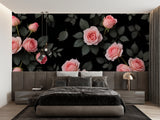 Pink rose pattern on black background enhancing a boutique dressing room