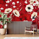 White poppy floral wallpaper mural in modern living room with grey sofa