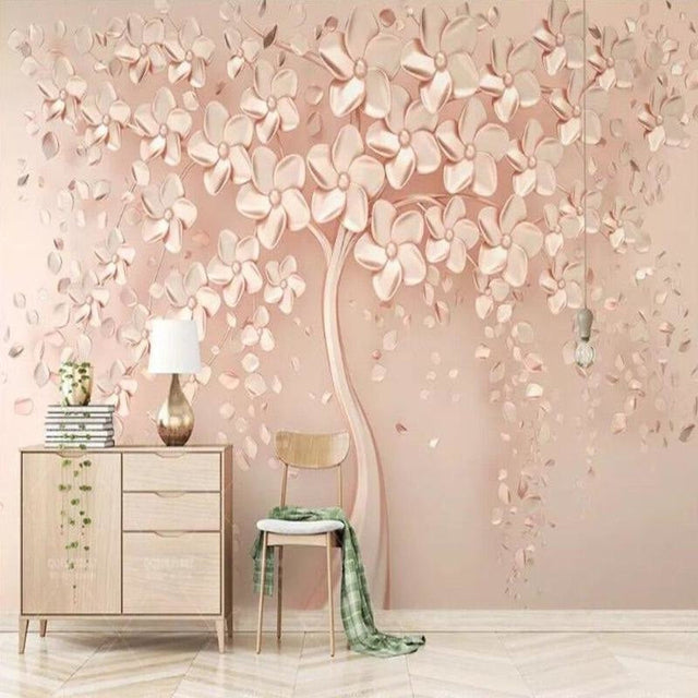 Rose gold tree wallpaper creating a luxurious accent wall in a modern bedroom with soft pink and gold decor elements
