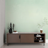 Mint green floral wallpaper in a bright modern living room setting with natural light