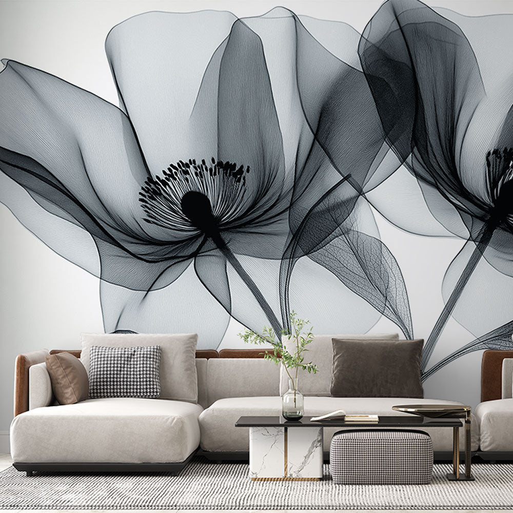 Black and white floral wallpaper creating an elegant atmosphere in a modern living room with natural light