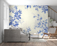 Blue and white floral wallpaper in bright modern living room showing pattern scale and room ambiance