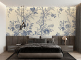 Blue Toile de Jouy wallpaper in a bright dining room with classic furniture and large windows