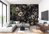 Dark floral wallpaper in modern living room showing cream blooms against black background
