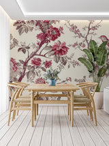 Classic floral wallpaper brightening a cozy bedroom with pink and cream accents