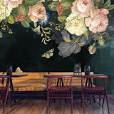 Dark floral wallpaper with vintage roses in a modern living room setting, creating an elegant atmosphere