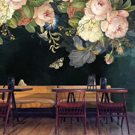 Dark floral wallpaper with vintage roses in a modern living room setting, creating an elegant atmosphere