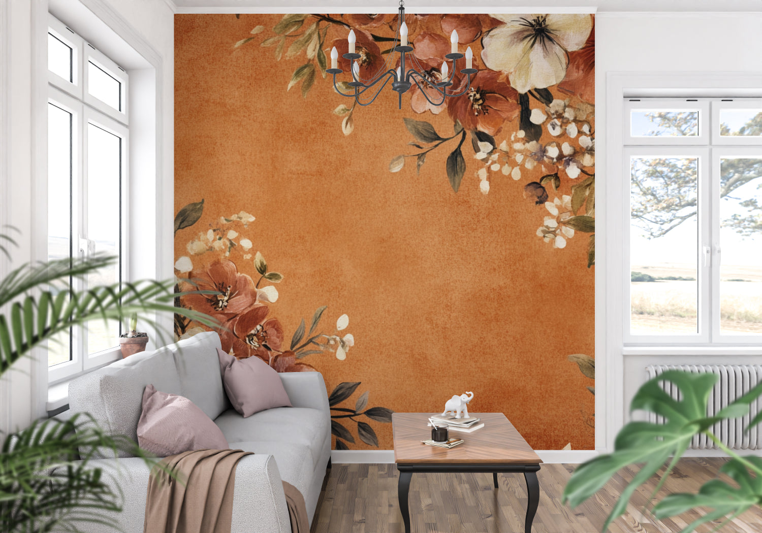 Terracotta floral wallpaper in modern living room showing warm rust and cream blooms against natural light