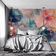 Watercolor floral wallpaper in modern living room showing pink and navy abstract petals creating depth