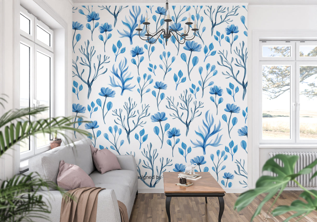 Watercolor botanical wallpaper brightening a cozy bedroom with white furniture