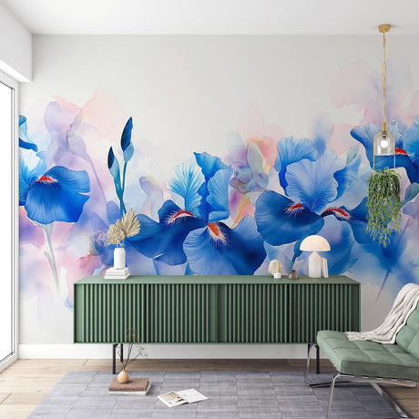 Blue iris watercolor wallpaper in a bright modern living room, showing how floral murals create a fresh, artistic atmosphere